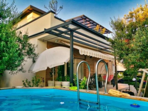 Apartments with a swimming pool Vodice - 23696